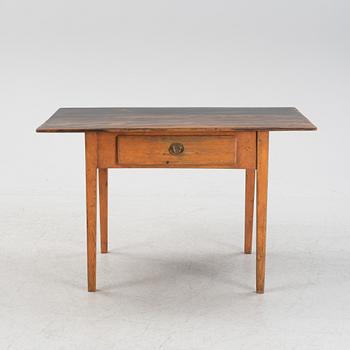 A painted pine table, 19th Century.