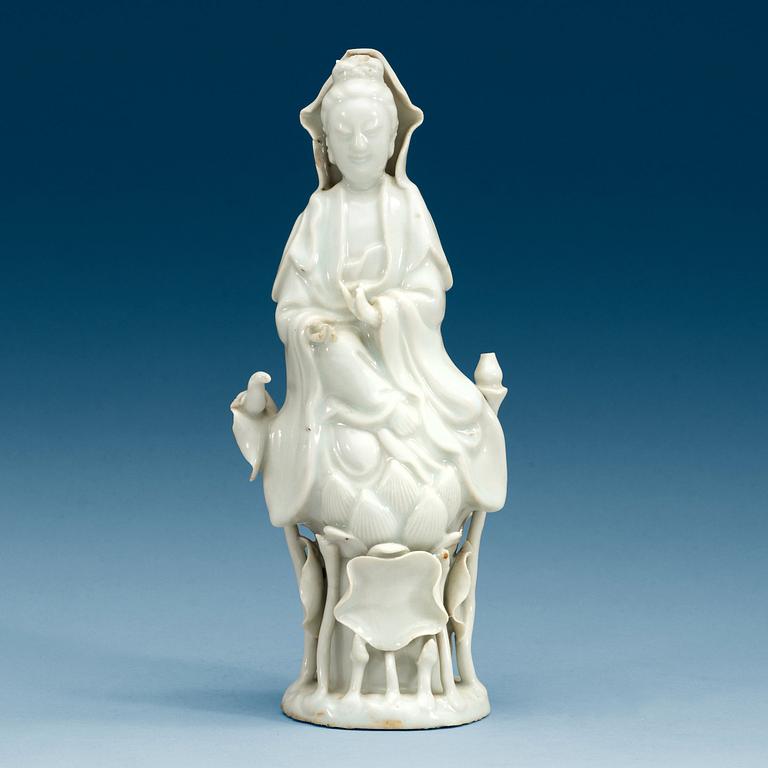 A Chinese blanc de chine figure of Guanyin, 20th Century.