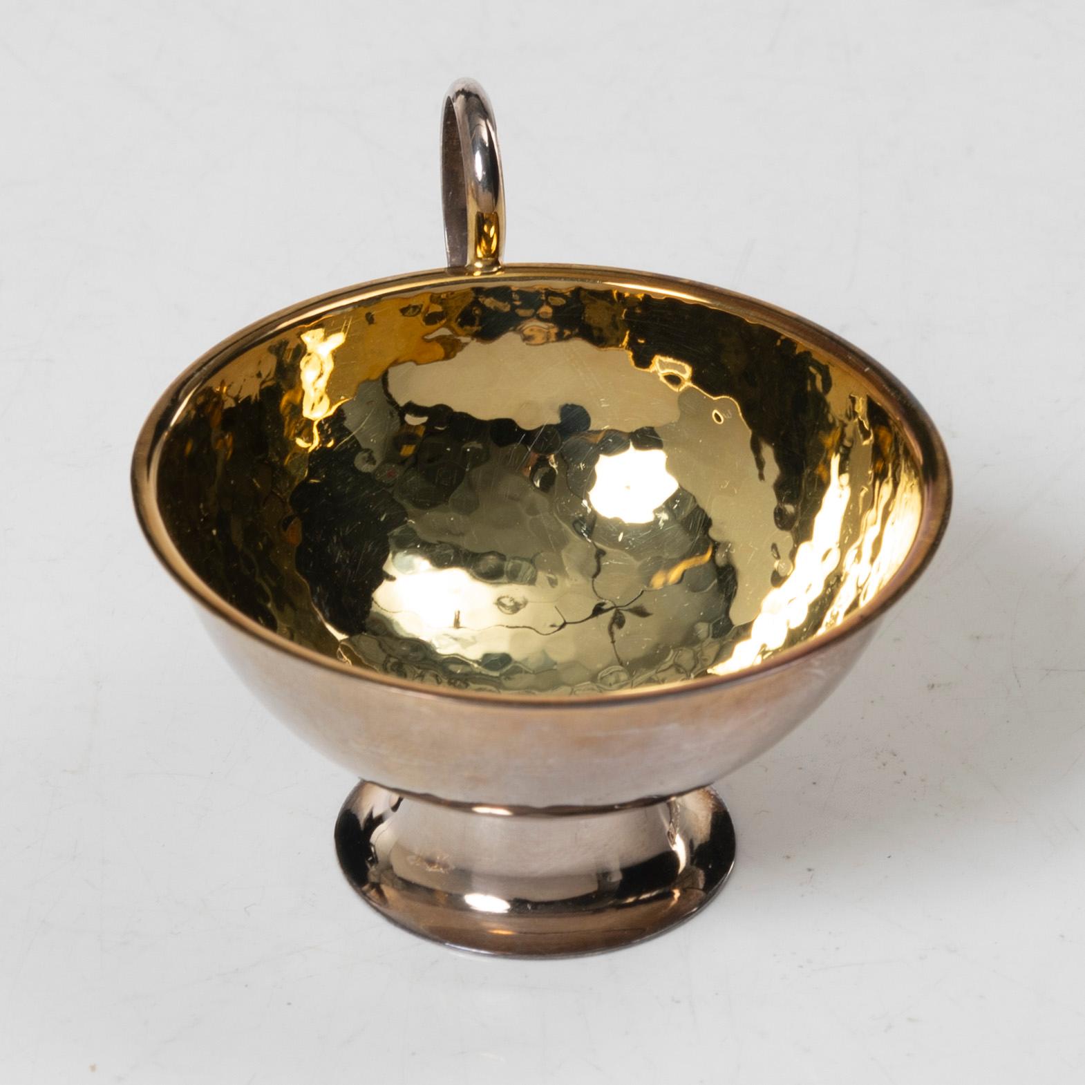 Guldsmedsaktiebolaget (GAB), A set of twelve silver punch mugs, Stockholm 1967-1968.