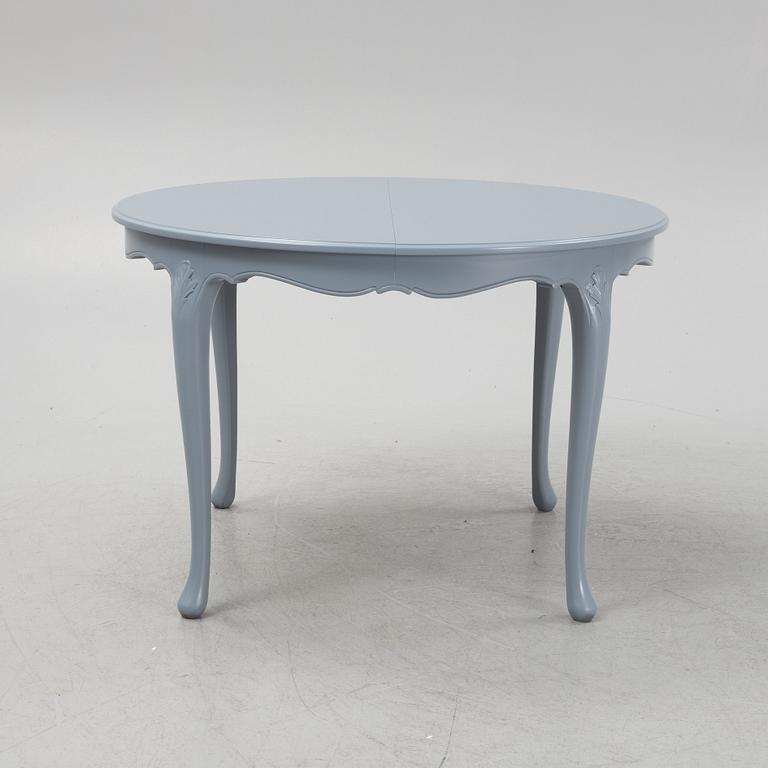 A Rococo style dining table, second half of the 20th Century.
