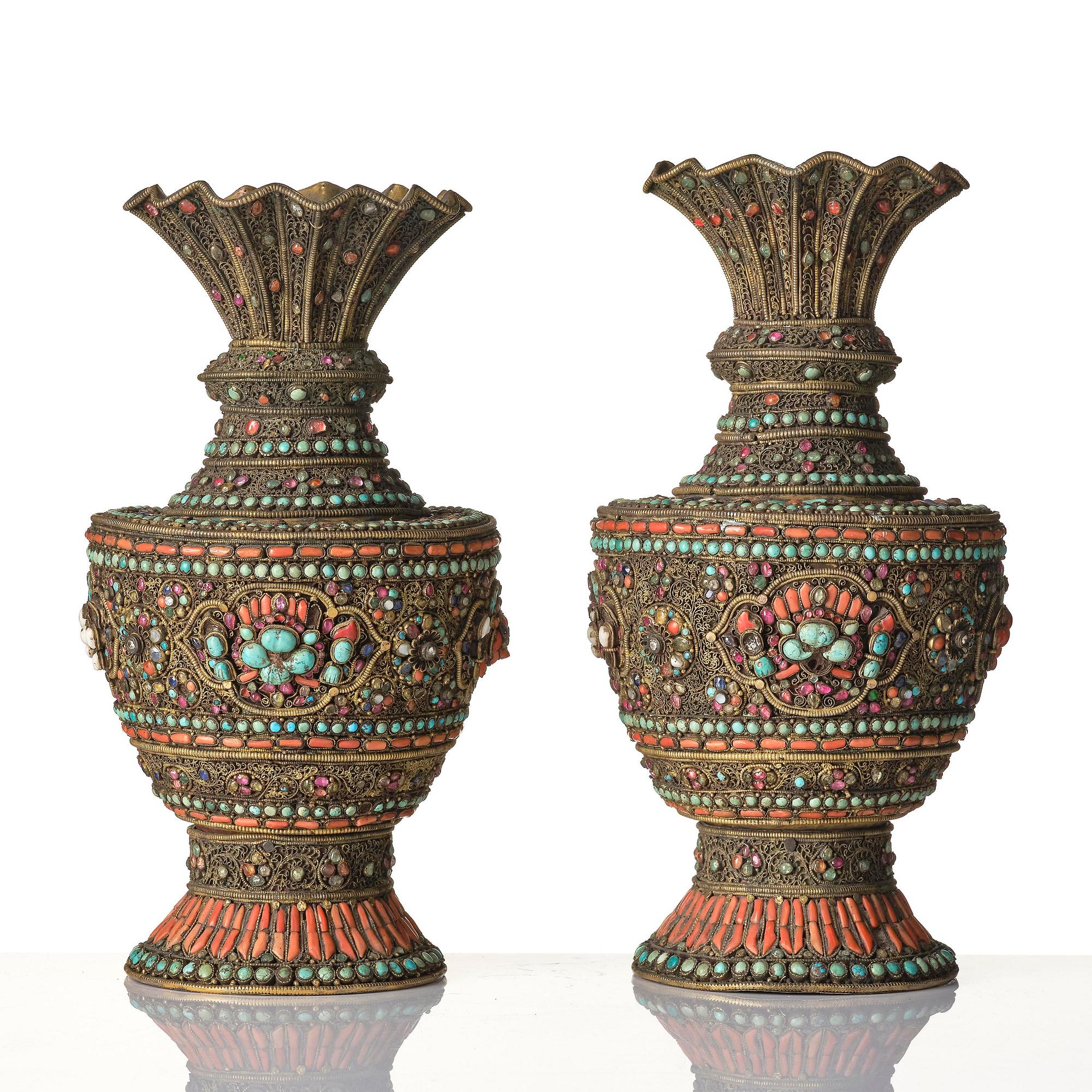 A pair of Tibetan/Nepalese filigree vases with stone inlay, 19th century.