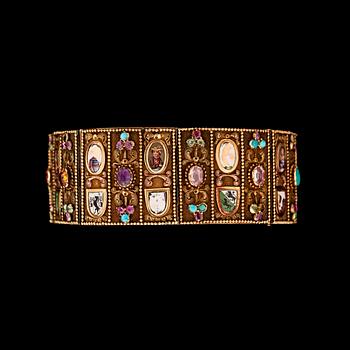 900. An enamel and ruby, turqoise, peridot, citrine and amethyst bracelet, c. 1850, Switzerland.
