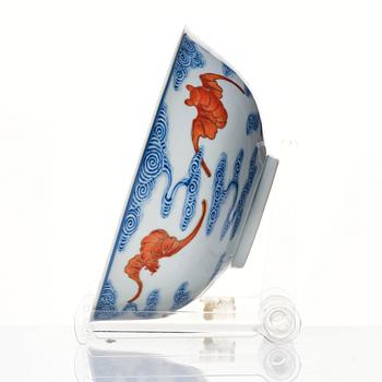 A Chinese iron-red-decorated blue and white Wufu bat bowl, late Qing dynasty, around 1900.