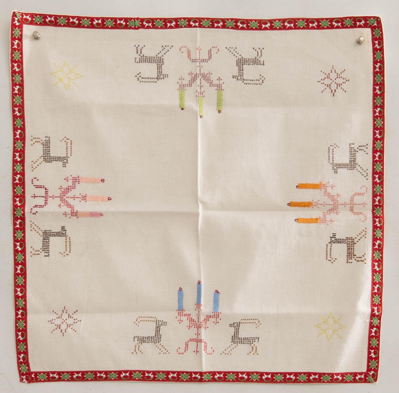 A collection of Christmas tablecloths 12 pcs first half/mid 20th century.