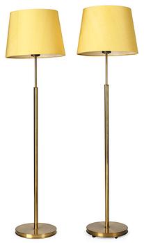 829. A pair of Josef Frank brass floor lamps, Firma Svenskt Tenn.