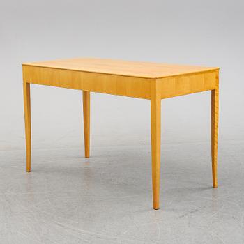 A 'Nya guldheden' desk by Carl Malmsten.