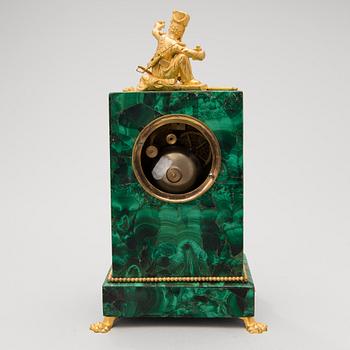 A mid 19th Century French gilt bronze and malachite mantel clock.