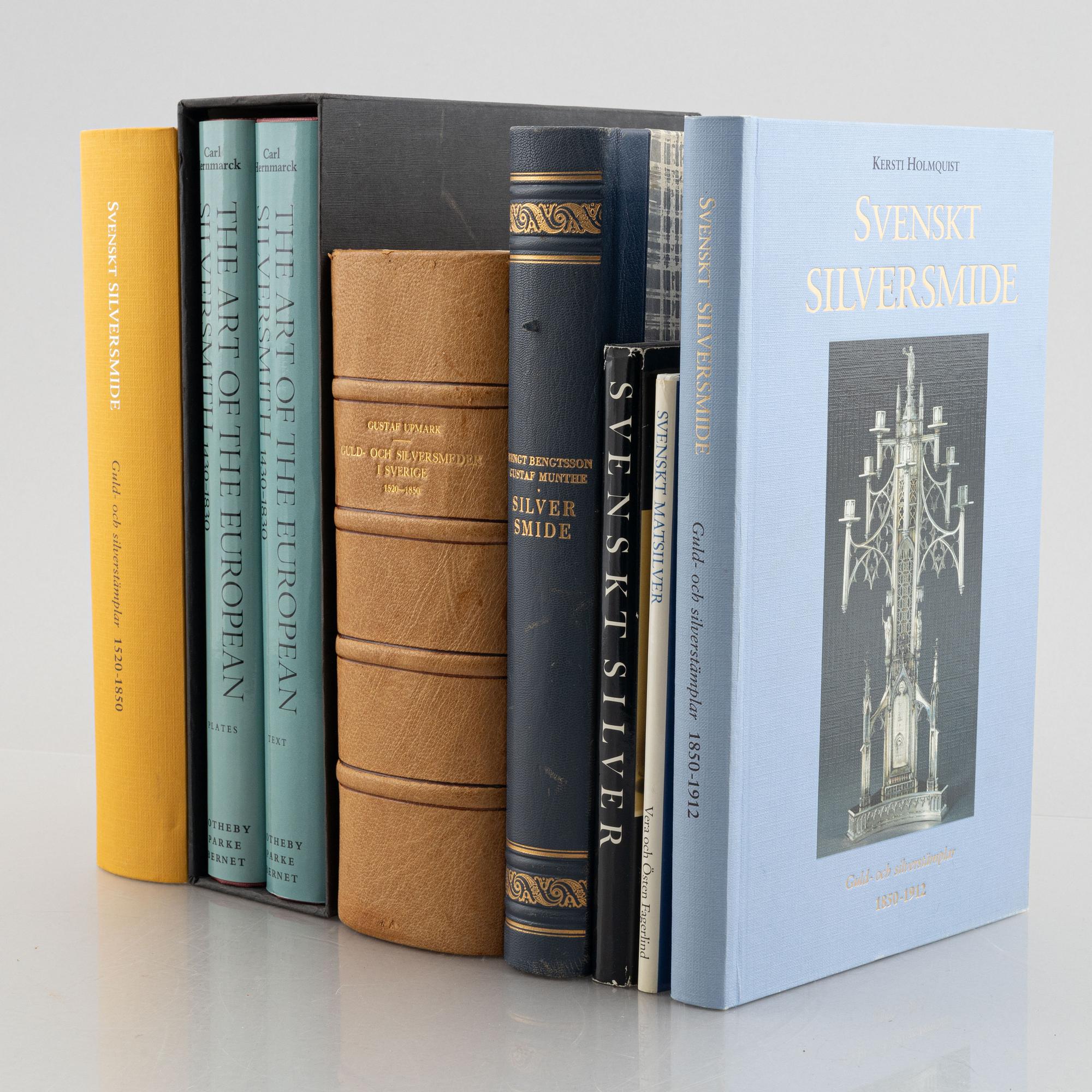 Collection of literature on silver, 8 volumes, including 'Svenskt silversmide 1520-1850'.