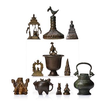 894. A small collection of bronzes, China, Burma and India. (11 pieces).