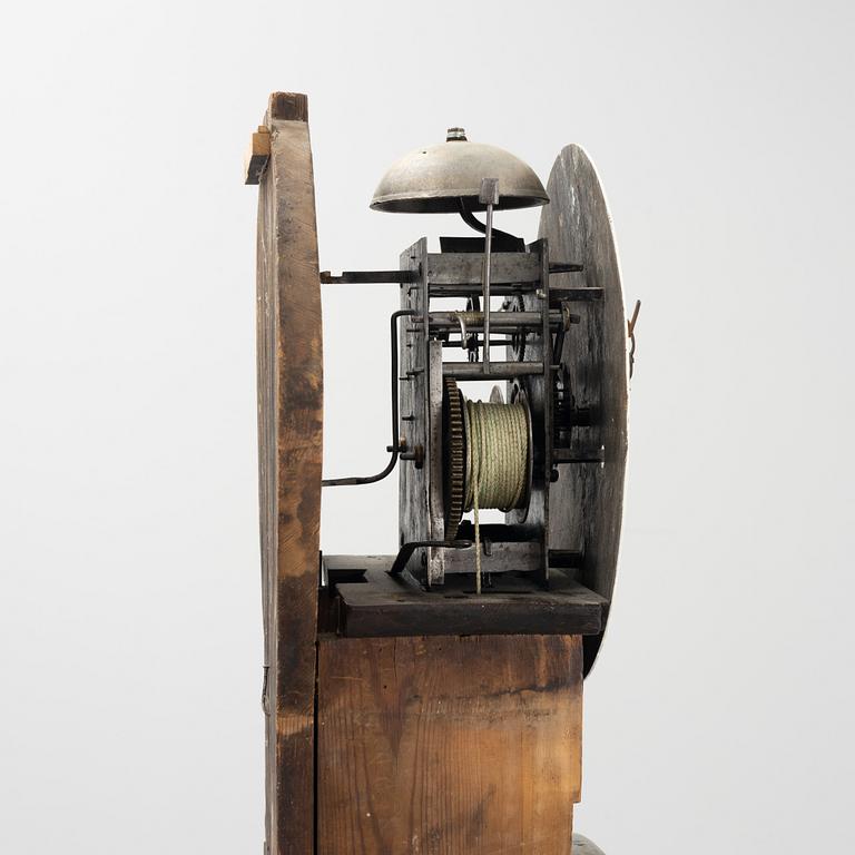 A longcase clock, 19th century.