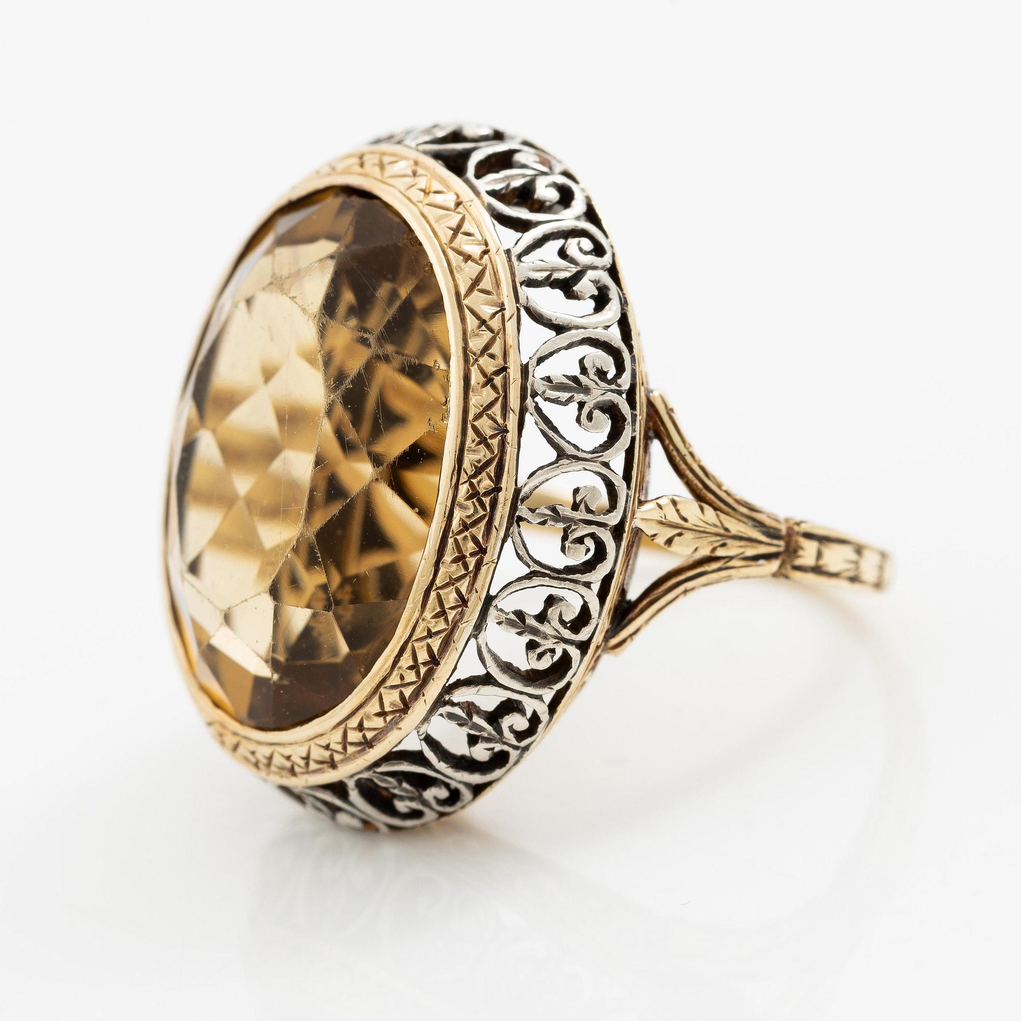 Ring 14K guld och silver med en fasettslipad citrin.