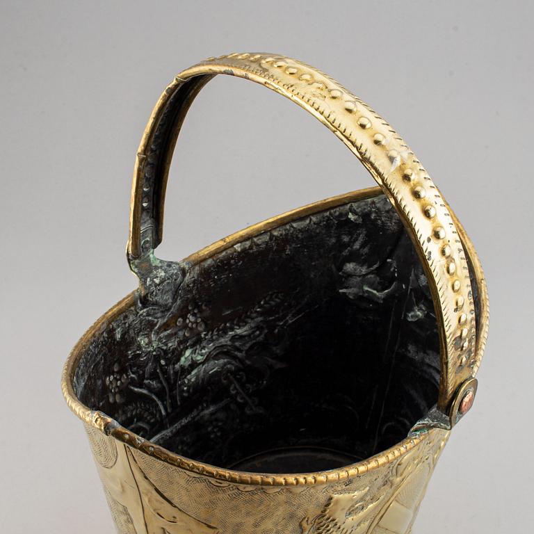 A mid 19th century brass flower basket.