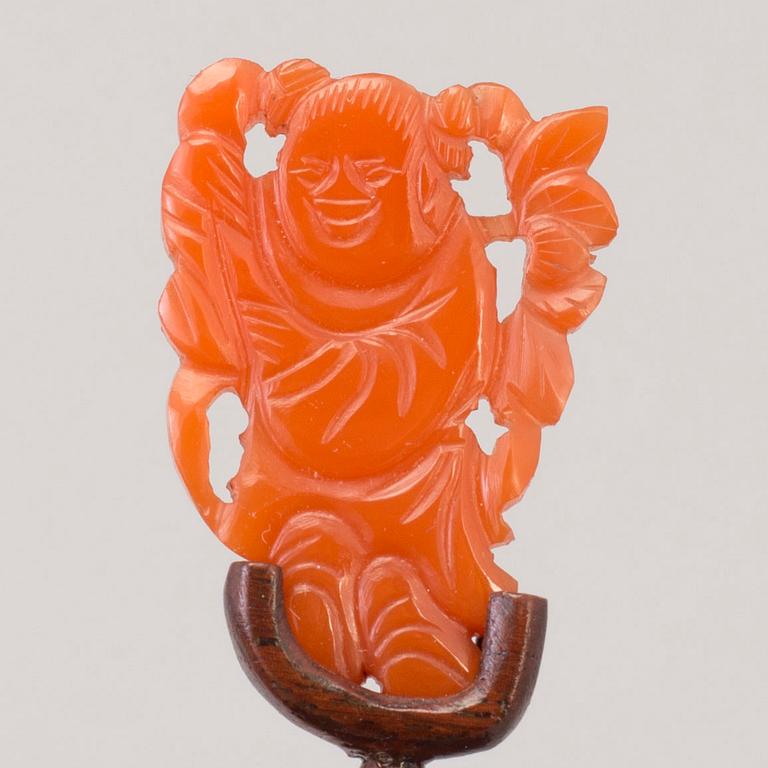 Three Chinese 20th century sculptures on stand, wood and agathe.