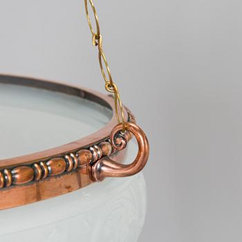 Kattovalaisin, 1900-luvun alku.