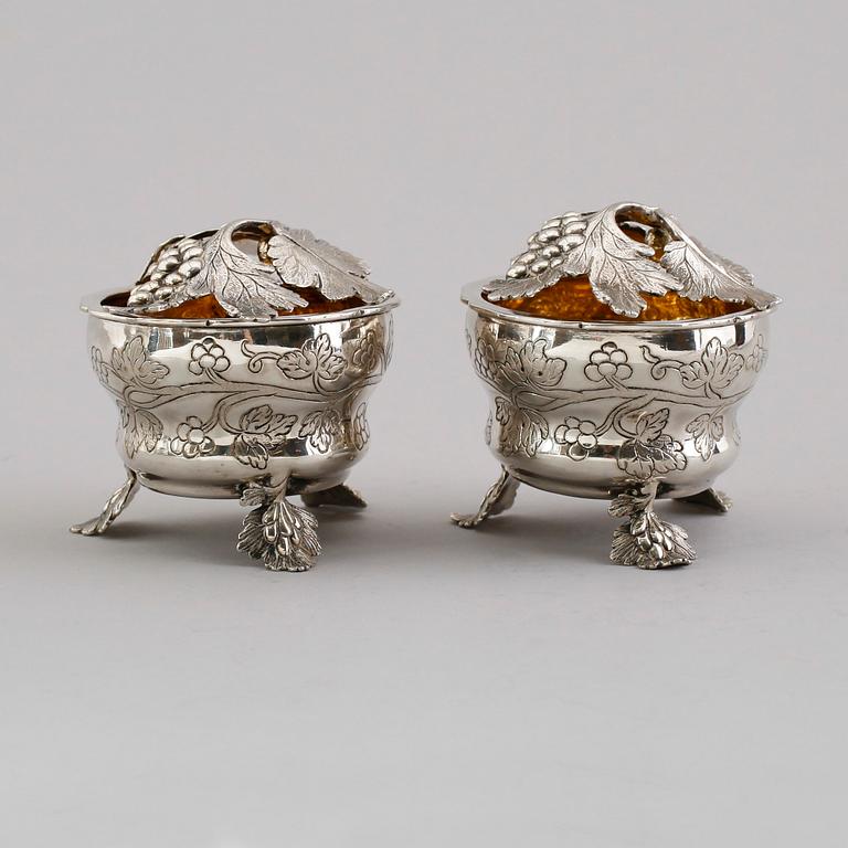 A pair of German 18th century parcel gilt jelly-pots, marks of  Johann Christoph Seelingslow, Magdeburg.