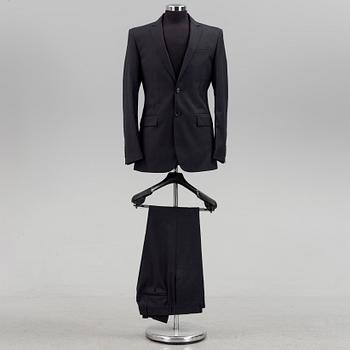 A suit by burberry, in size 48R.