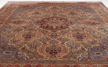 A semi-antique Moud carpet, c 443 x 360 cm.