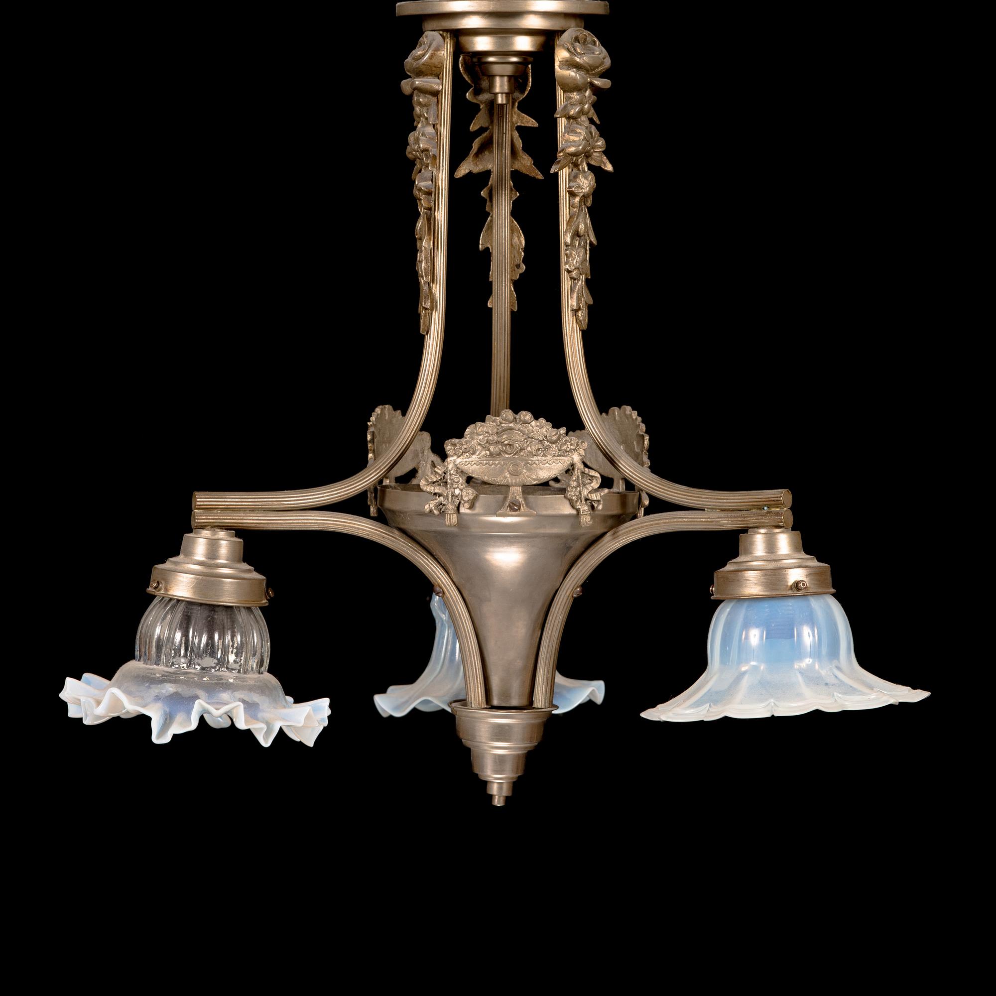 Kattovalaisin, 1900-luvun alkupuoli.