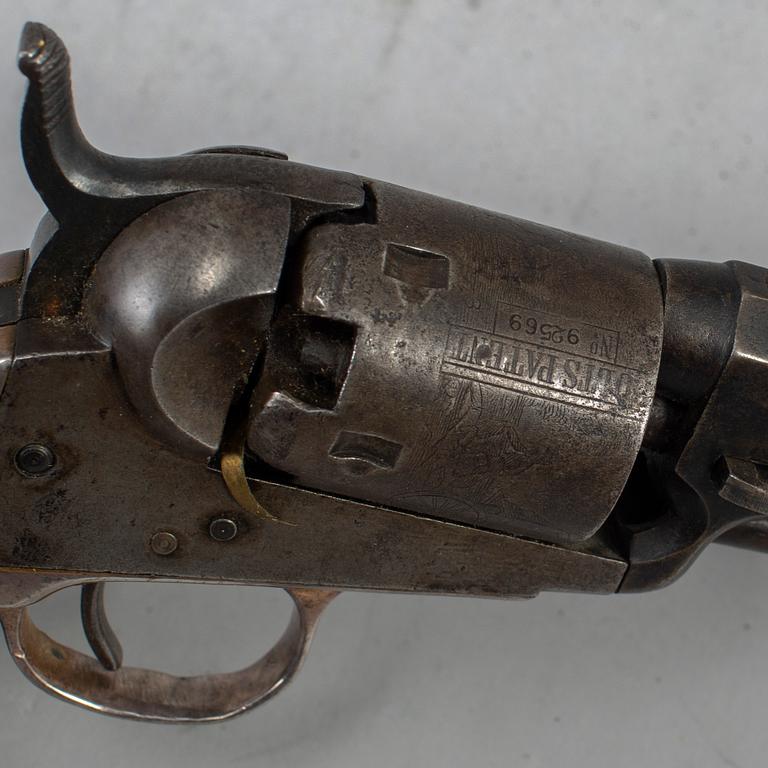 A Colt 1849 pocket percussion revolver with serial no 92569.