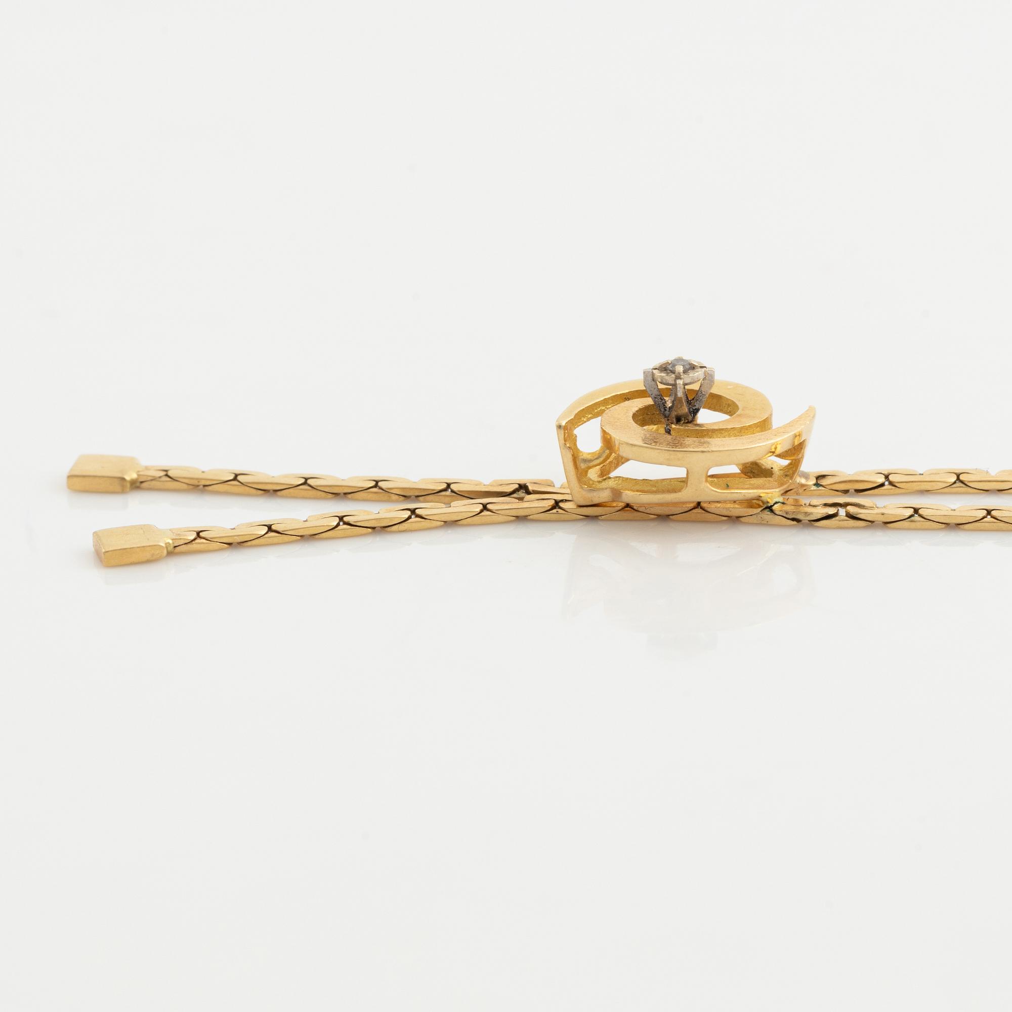 Collier, 18K gold with a small diamond.