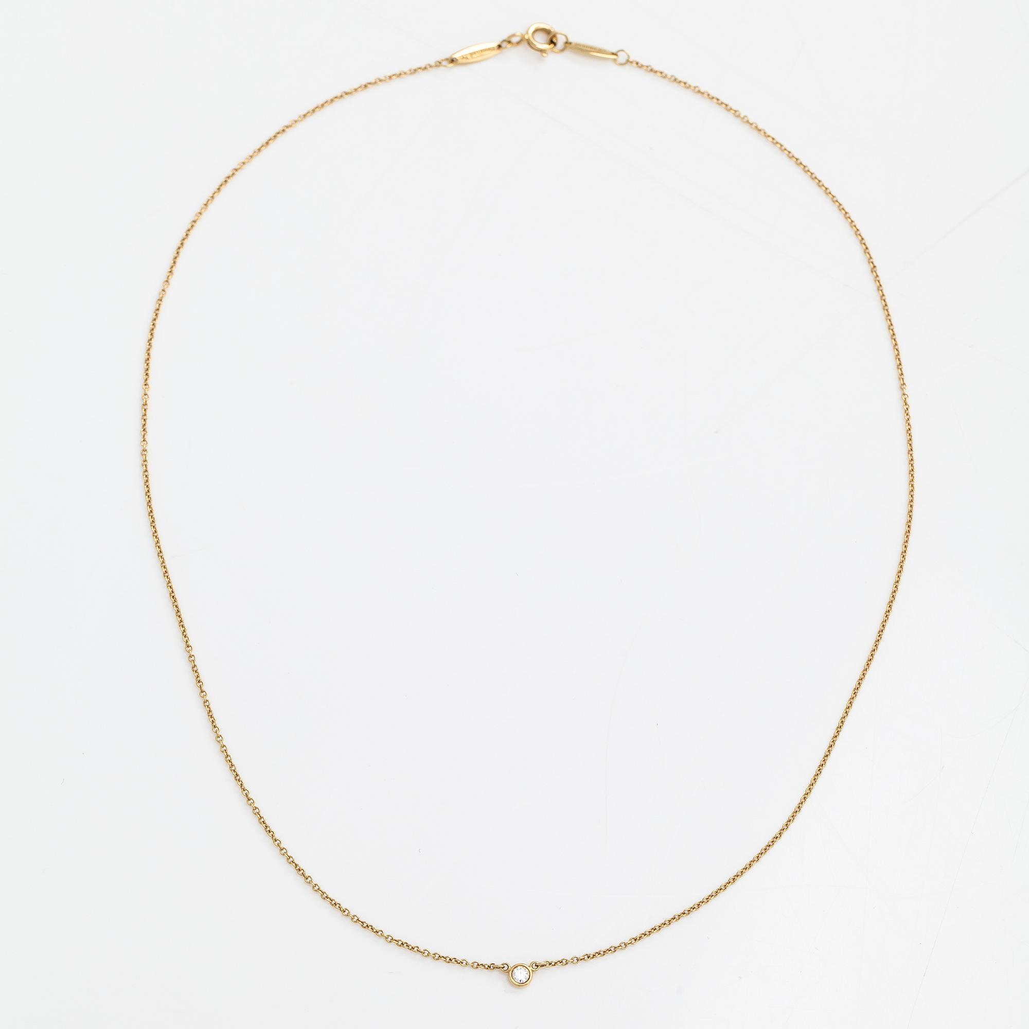 Tiffany & Co, Elsa Peretti, halsband, 18K guld och diamant ca 0.05 ct. Märkt Tiffany & co, Peretti.