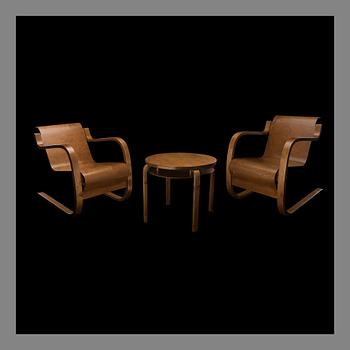 ALVAR AALTO, PAIR OF ARMCHAIRS NO 31 AND TABLE NO 70. Chairs designed for Paimio Sanatorium in 1932.