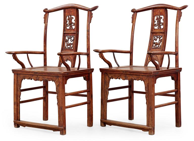 A pair of hardwood armchairs, late Qing dynasty (1644-1912).