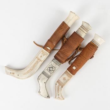 Three reindeer horn knives all signed.