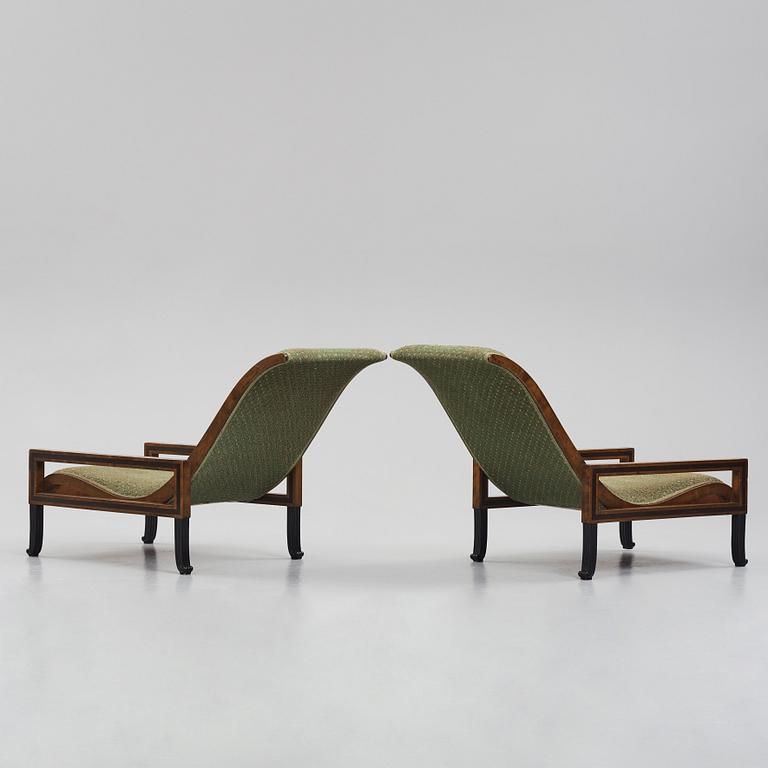 Carl Hörvik, a pair of mahogany-stained birch lounge chairs, Swedish Grace 1920s.