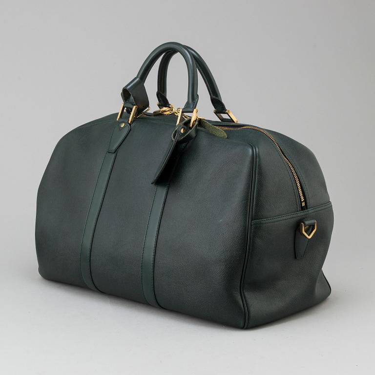 LOUIS VUITTON, 'Green Taïga Kendall PM' bag.