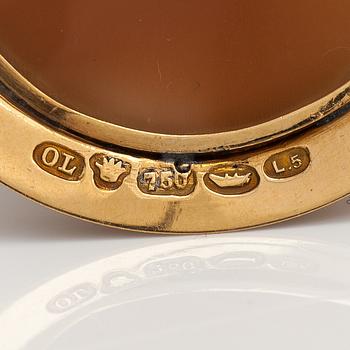 An 18K gold and cameo brooch. Oskar Lindroos, Helsinki 1916.