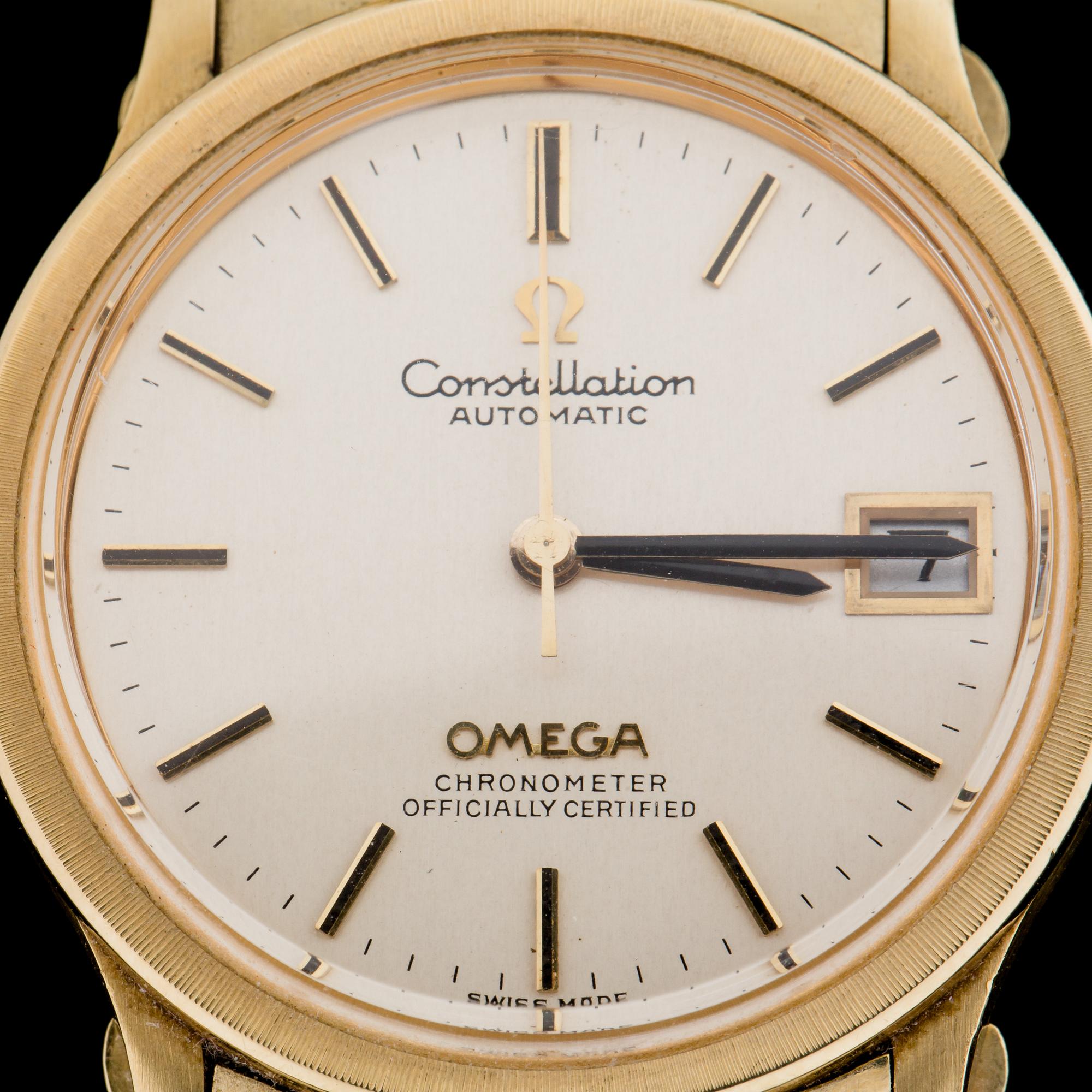 ARMBANDSUR, herr. 18K resp. 14K guld. Omega Constellation.  1960-tal.