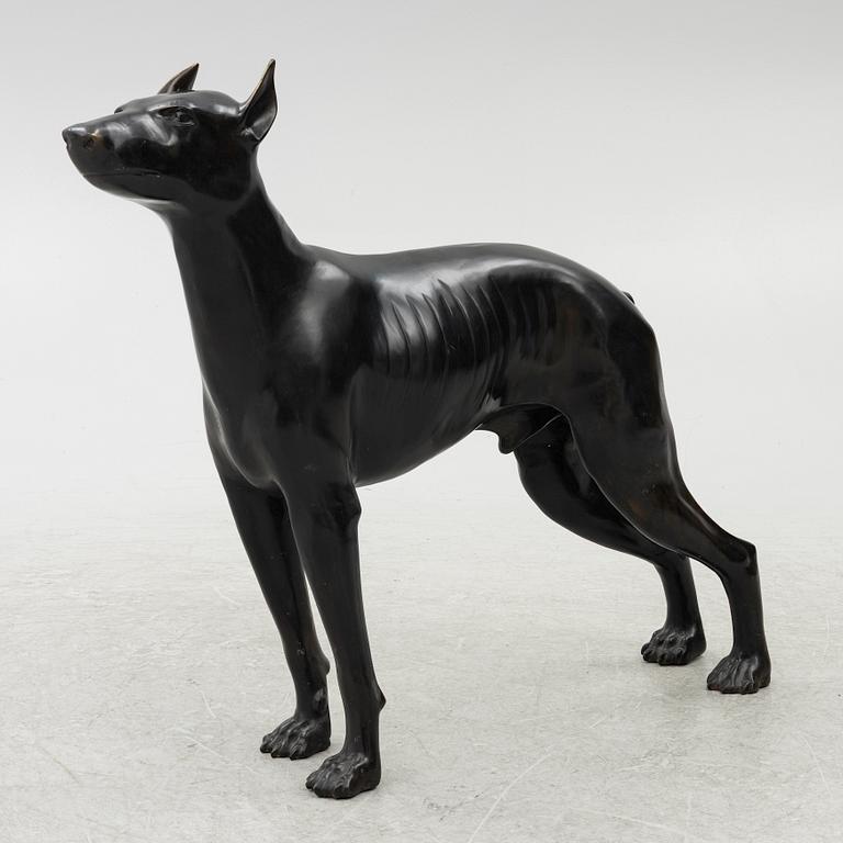 A decorative sculpture of a dog, 20th/21st century.