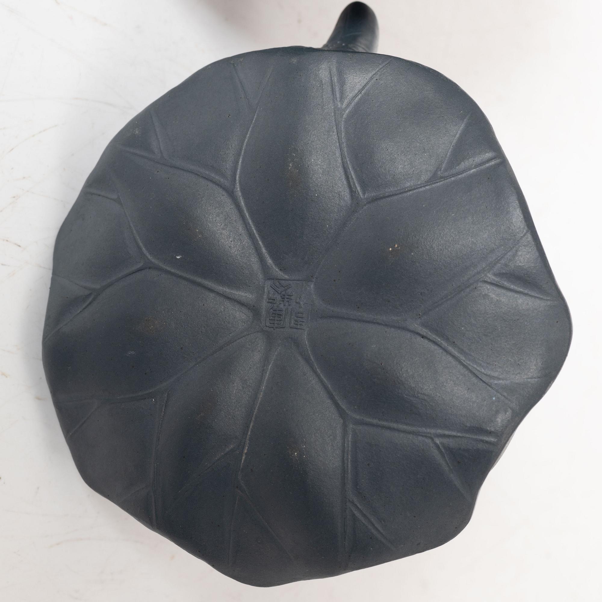 Two Chinese yixing ware teapots, 20th century.