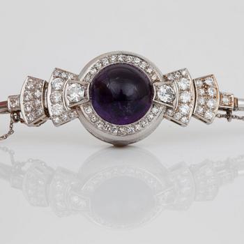 A cabochon-cut amethyst and old-cut diamond bracelet.