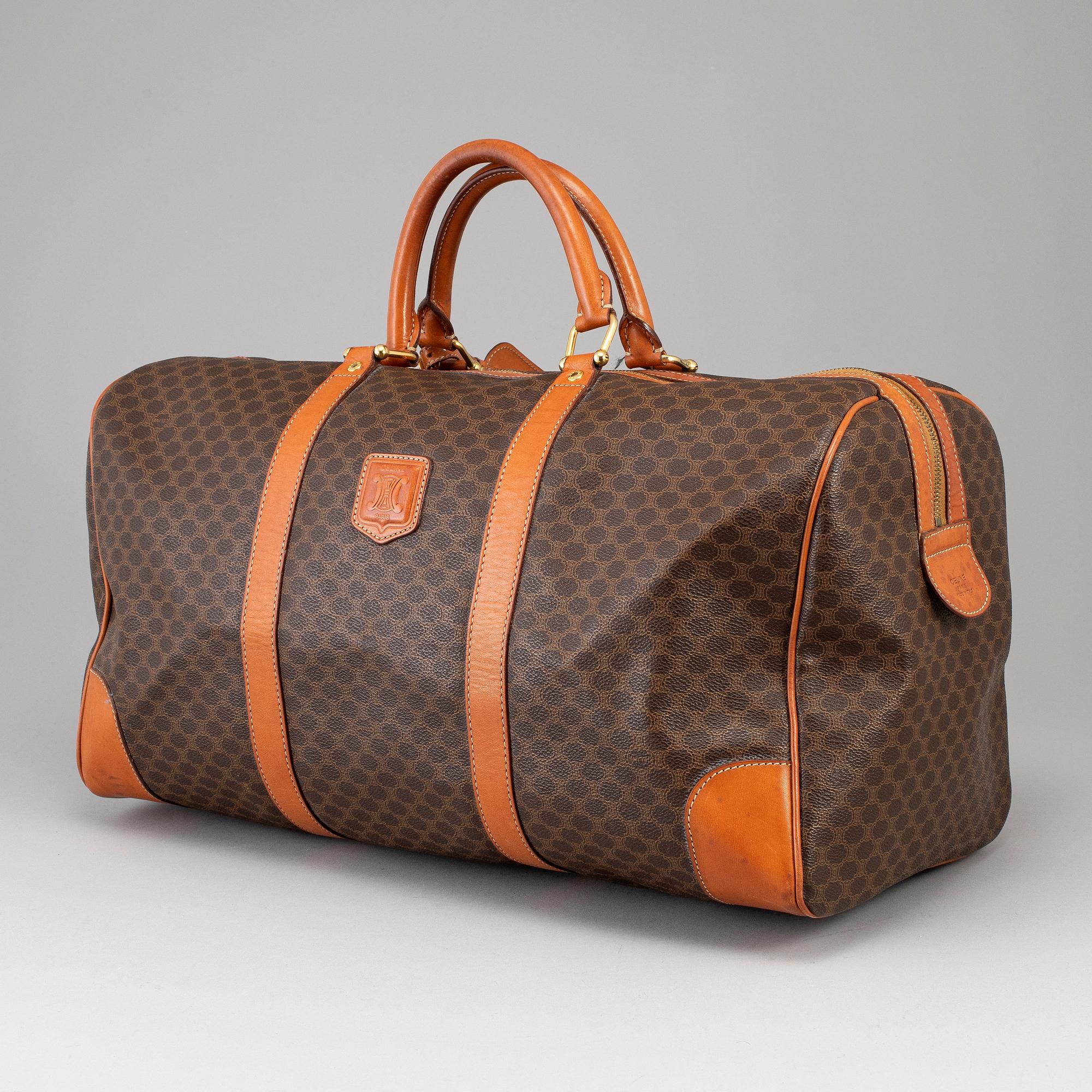 CÉLINE, a 'Macadam Duffle' bag.