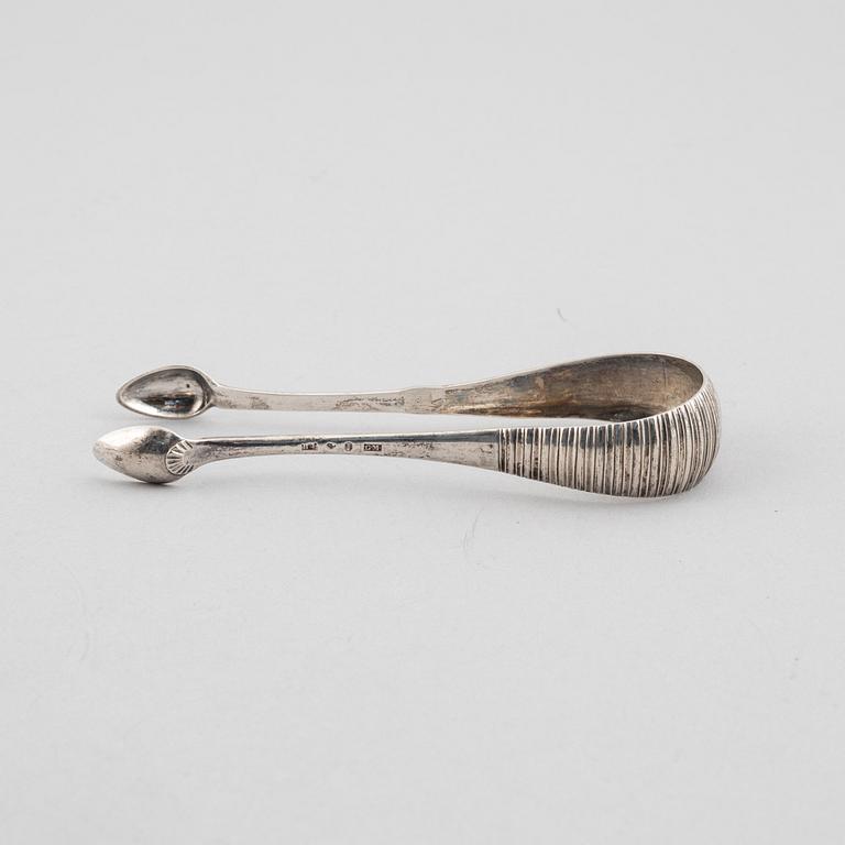 Three silver tongs, Sweden and Denmark, 1834-1923.