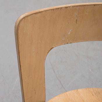 An end of the 20th century children's chair and table by Alvar Aalto, Artek, Finland.