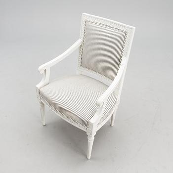 A late 18th century Swedidh Gustavian open arm chair.