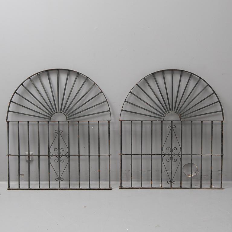 A pair of spanish iron windowgrills.