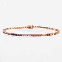 An 18K rose gold tennis bracelet with multi-coloured treated diamonds ca. 2.41 ct tot. according to engraving.