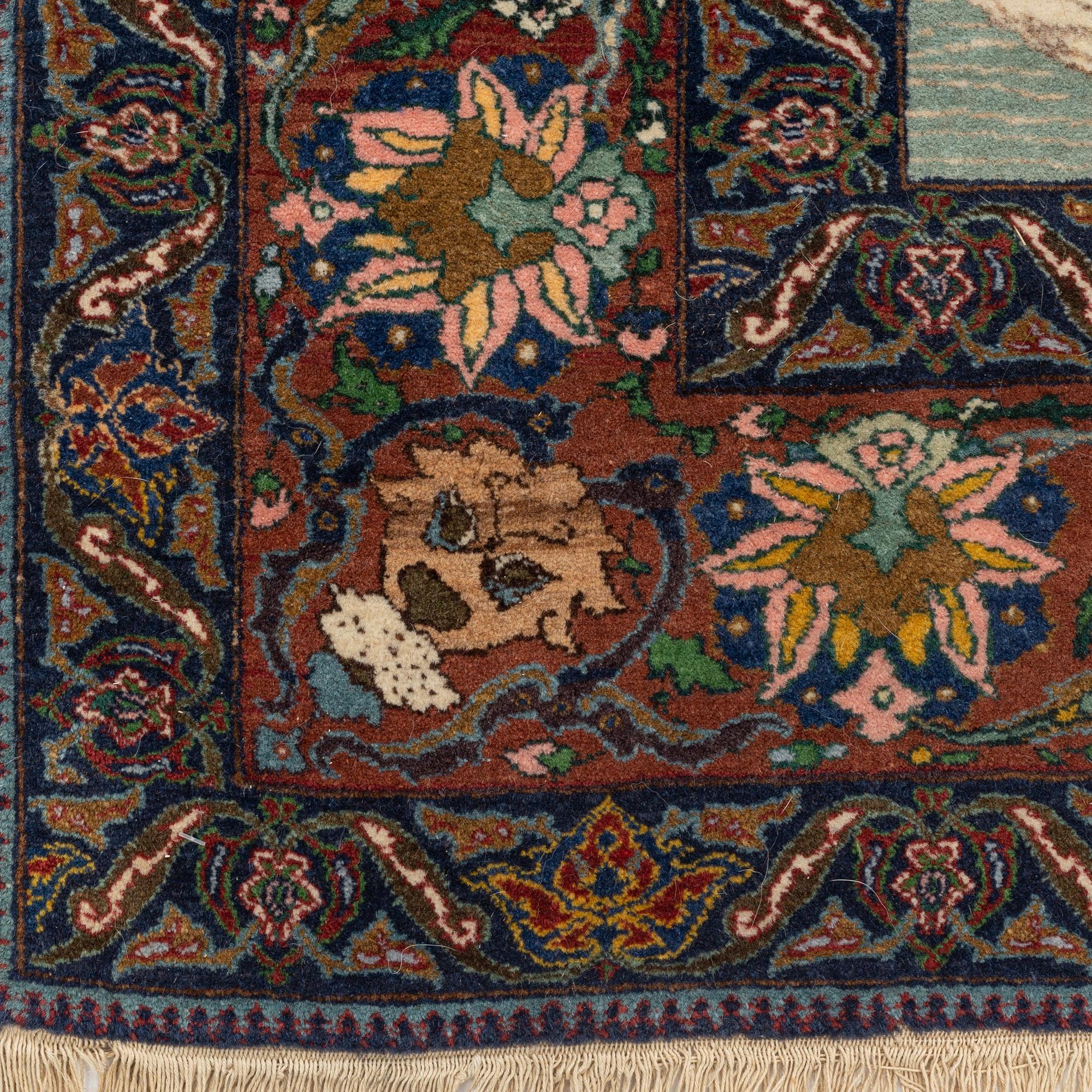 A carpet, semi-antique, Tabriz, signed, ca 271 x 175 cm.