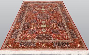 A pictoral orietal silk rug, 246 x 153 cm.