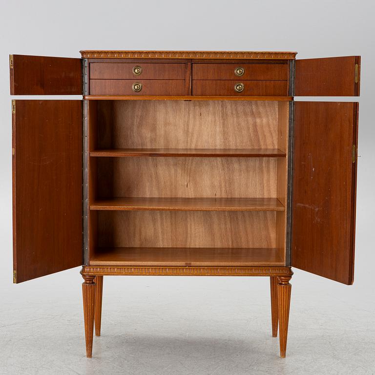 A cabinet, around the mid-20th century.