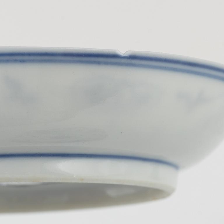 a pair of blue and white cups and three dishes, China, late Qing dynasty.