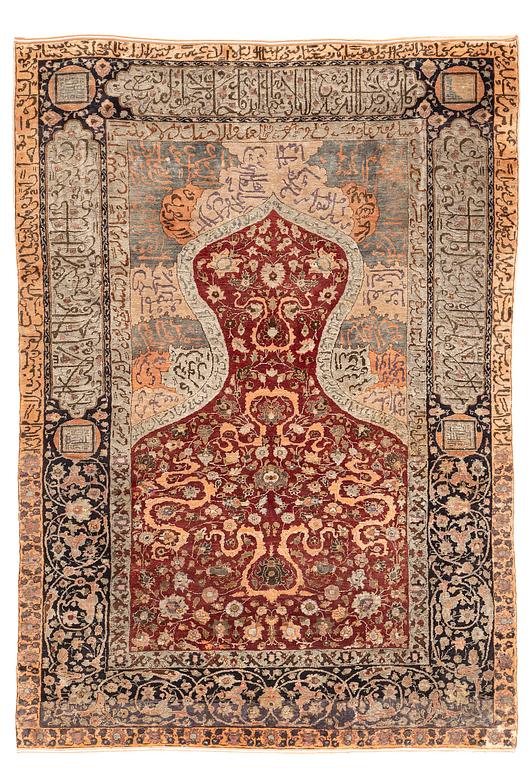An antique silk rug, probably Istanbul, Turkey, c. 181 x 127 cm.