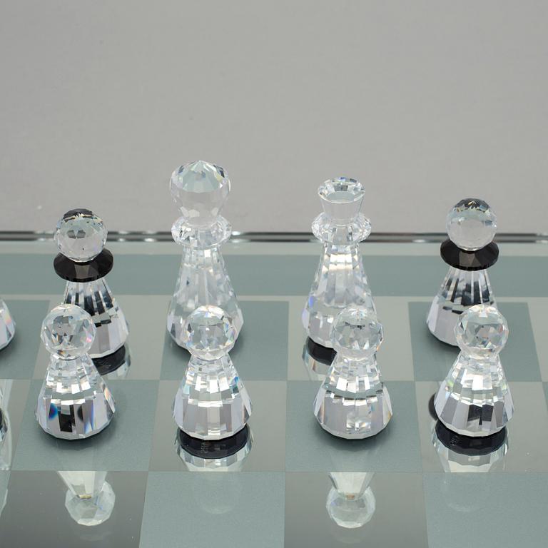 A SWAROVSKI CHESS SET.
