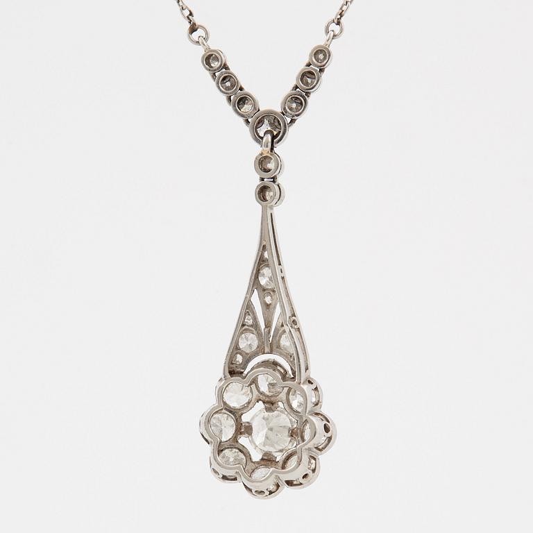 A platinum necklace set with old- and eight-cut diamonds.