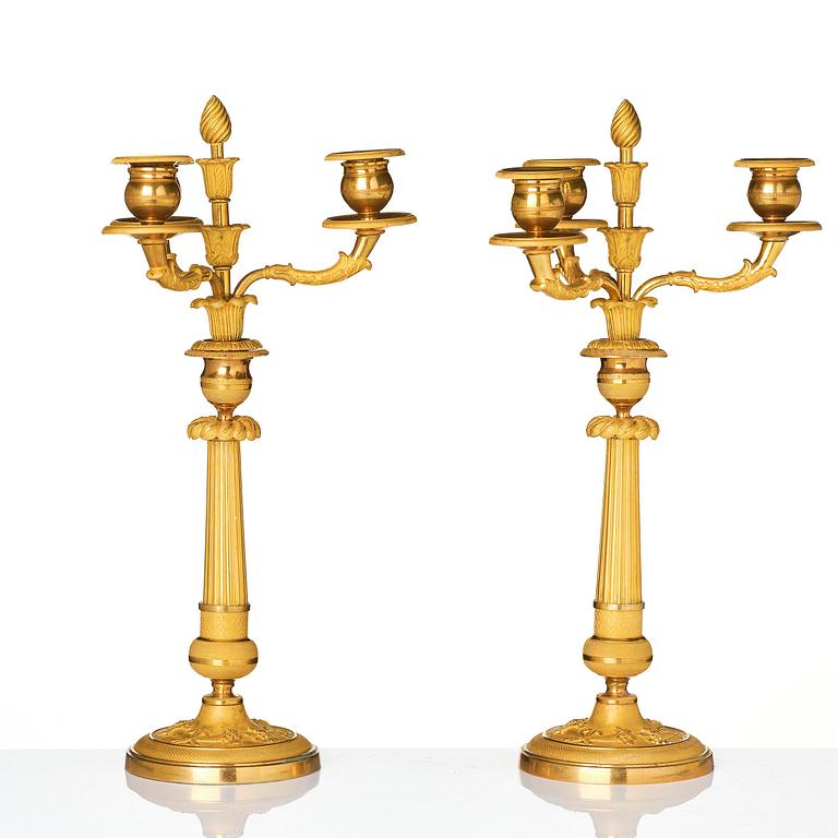 A pair of Empire ormolu three light Candelabra.