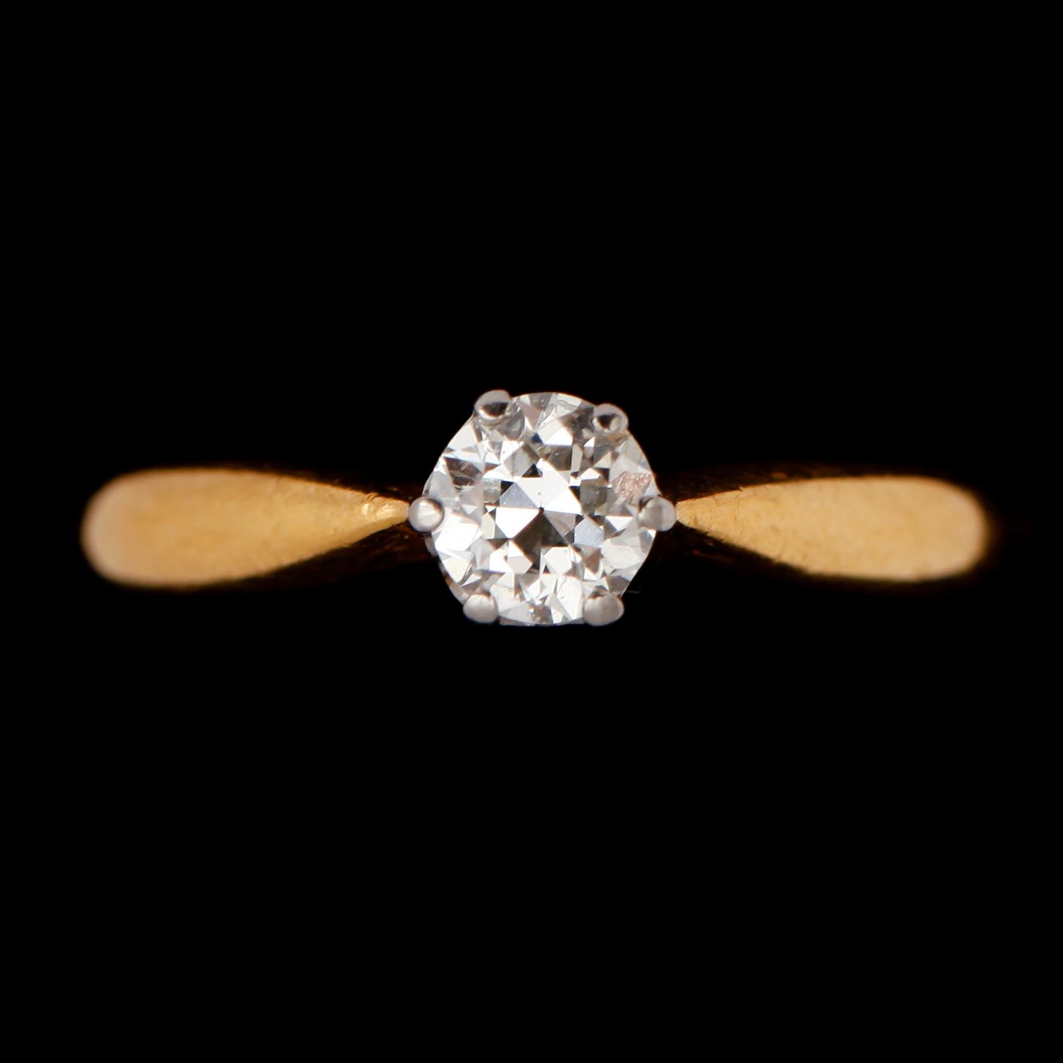 RING, 23 k guld, med solitär briljant ca 0.50 ct.